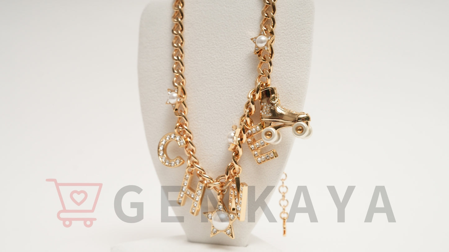 CHANEL C24C GP ロゴ ラインストーン チョーカー ローラスケート ネックレス ゴールド