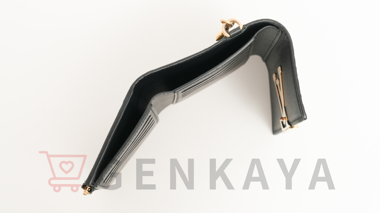 LOUIS VUITTON トリヨン ポルトフォイユカプシーヌ M83474 ノワール コンパクトウォレット RFID反応あり